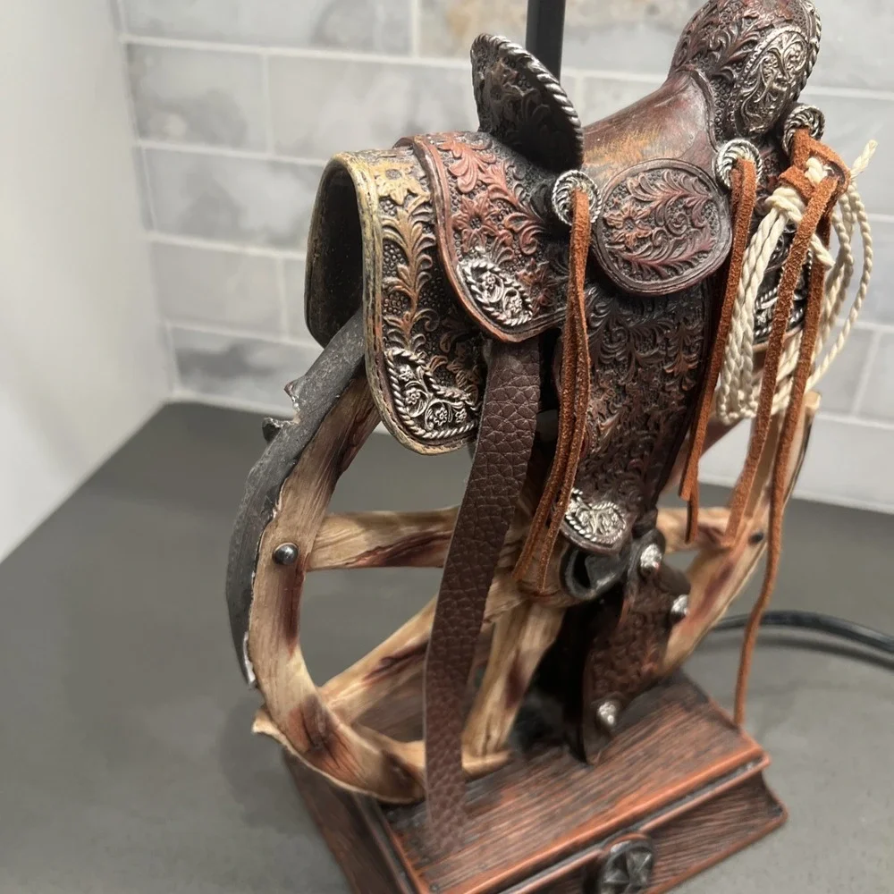 Western vintage Saddle Lamp rope on the saddle, sitting on a wheel/NO LAMP SHADE